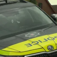 Police fired at stolen PSNI car before officer struck