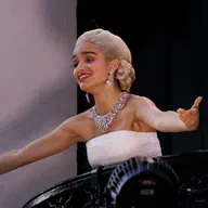 Evita Sings for the People in London; Gangs in Peru Target Schools