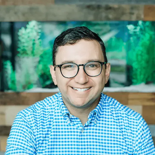 WE ARE PIUS: Dr. Phil Boucher ’03 with Principal Tran on technology for teens