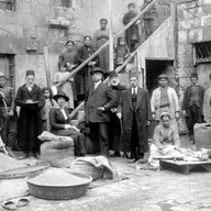 S8 Ep409:   Ahmad Sharawi and Bill Roggio report a fragile deal where the SDF integrates into the Syrian state to avoid destruction, though tensions remain regarding Turkey and the fate of ISIS prisoners in the northeast.